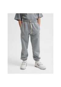 Spodnie dresowe dla dzieci Hummel Bee. Kolor: szary. Materiał: dresówka. Sport: joga i pilates #1