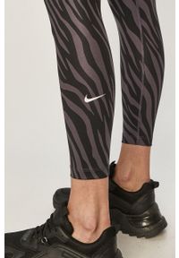 Nike - Legginsy. Stan: podwyższony. Kolor: fioletowy. Materiał: dzianina, skóra, elastan, tkanina, poliester, włókno #3