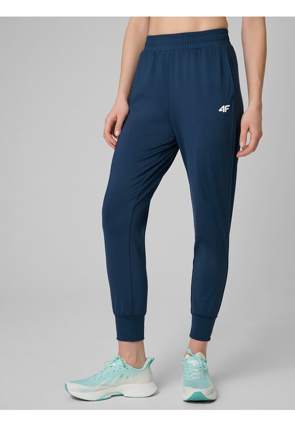 4f - 4F Spodnie treningowe szybkoschnące damskie - turkusowe XS. Kolor: turkusowy. Materiał: materiał, elastan. Sport: fitness
