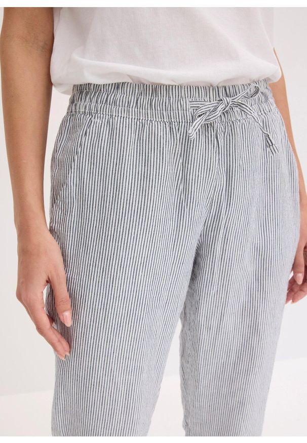 bonprix - Spodnie lniane z elastyczną talią. Kolor: niebieski. Materiał: lyocell, len. Sezon: lato