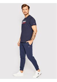 Tommy Jeans Spodnie dresowe DM0DM15380 Granatowy Slim Fit. Kolor: niebieski. Materiał: bawełna, syntetyk