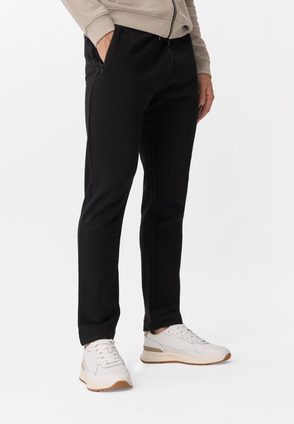 Volcano - Klasyczne spodnie dresowe N-DEN. Kolor: czarny. Materiał: dresówka. Sport: fitness