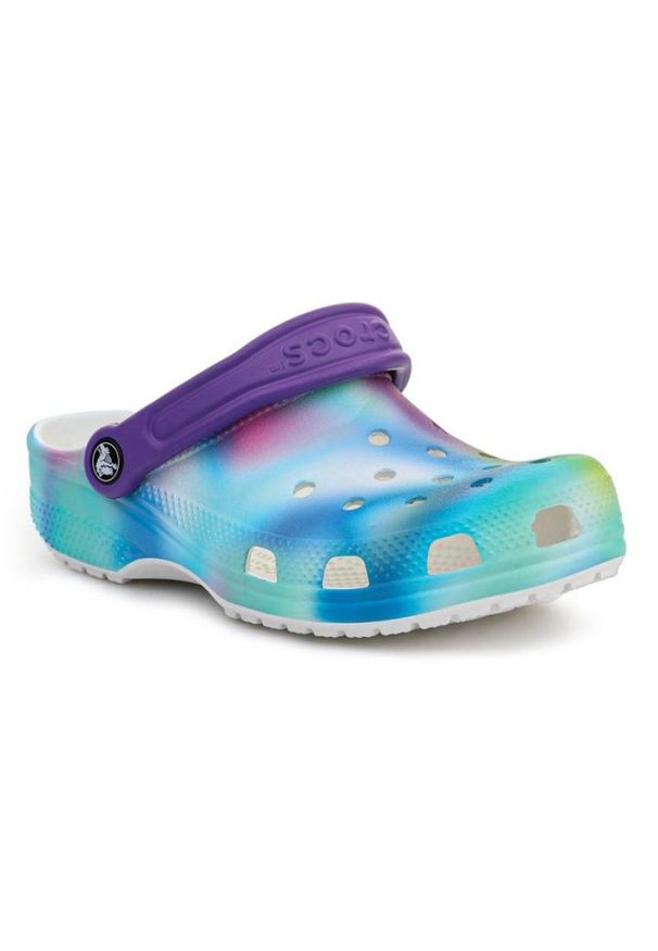Klapki Crocs Classic Solarized Kids Clog 207587-94S niebieskie wielokolorowe. Okazja: na co dzień. Kolor: wielokolorowy, niebieski. Materiał: syntetyk. Wzór: kolorowy. Sezon: lato. Styl: casual