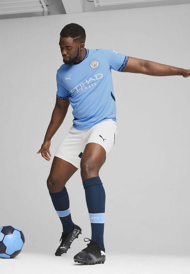 Puma - Męska koszulka domowa Manchester City 24/25 PUMA Team Light Blue Marine. Kolor: niebieski