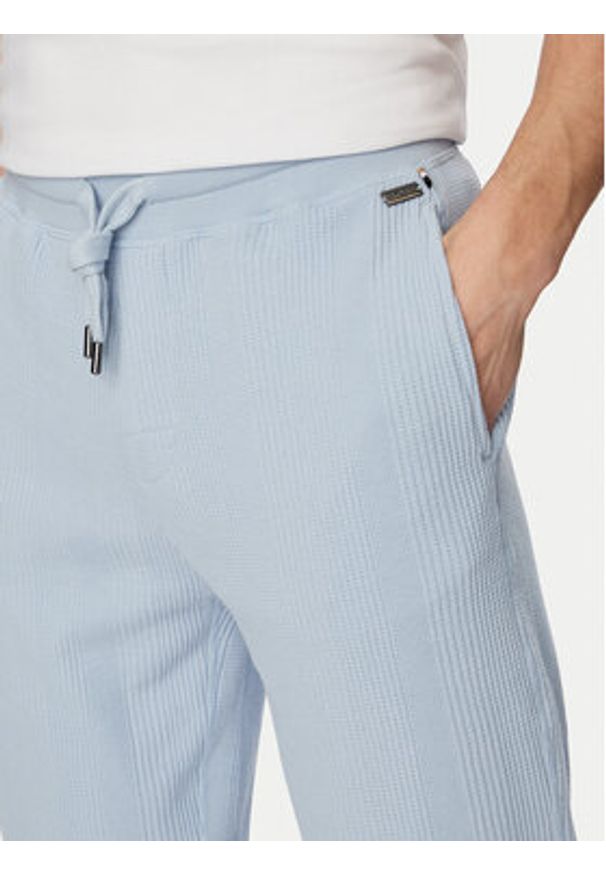 BOSS Spodnie dresowe Structure 50540577 Niebieski jasny Regular Fit. Kolor: niebieski. Materiał: syntetyk