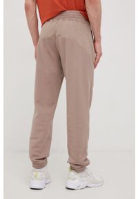 adidas Originals spodnie dresowe bawełniane HC9461 męskie kolor beżowy gładkie. Kolor: beżowy. Materiał: bawełna, dresówka. Wzór: gładki #3