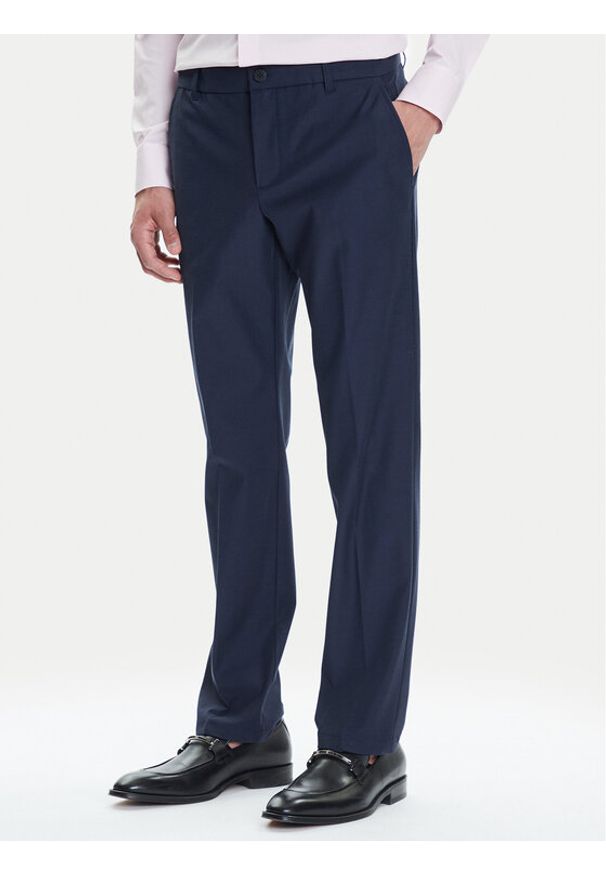 Guess Spodnie materiałowe M4YB01 WG9Z2 Granatowy Slim Fit. Kolor: niebieski. Materiał: syntetyk