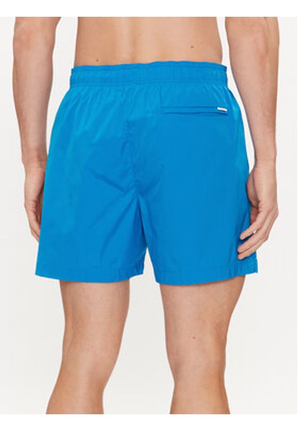 Calvin Klein Swimwear Szorty kąpielowe KM0KM00939 Niebieski Regular Fit. Kolor: niebieski. Materiał: syntetyk