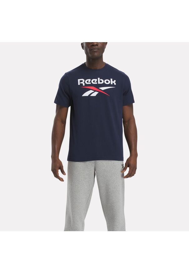 Koszulka fitness męska Reebok krótki rękaw. Kolor: niebieski. Materiał: bawełna. Długość rękawa: krótki rękaw. Długość: krótkie. Sport: fitness
