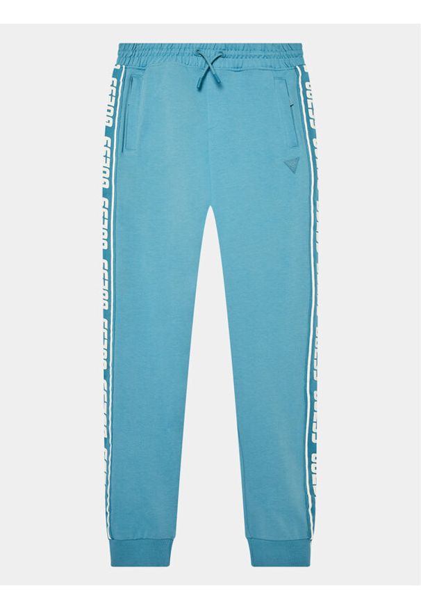 Guess Spodnie dresowe L2YQ48 K6ZS1 Niebieski Regular Fit. Kolor: niebieski. Materiał: bawełna