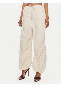 Juicy Couture Spodnie materiałowe Ayla JCWBJ24341 Beżowy Oversize. Kolor: beżowy. Materiał: syntetyk