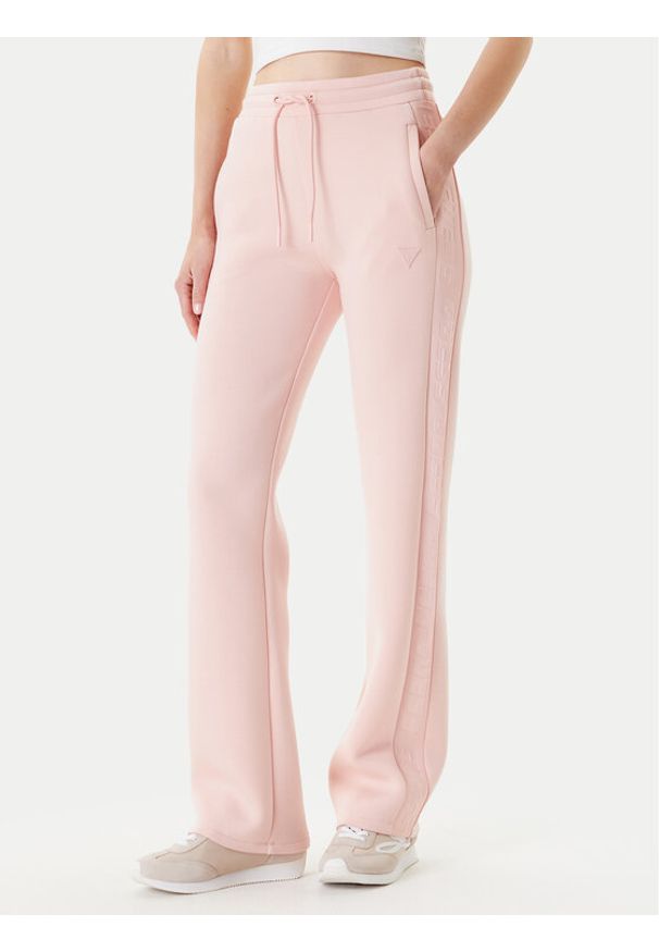 Guess Spodnie dresowe V3RB21 K7UW2 Różowy Regular Fit. Kolor: różowy. Materiał: wiskoza