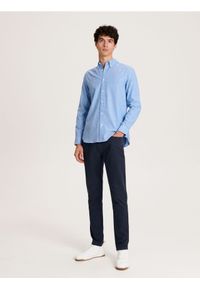 Reserved - Spodnie chino slim - granatowy. Kolor: niebieski. Materiał: tkanina, bawełna #1