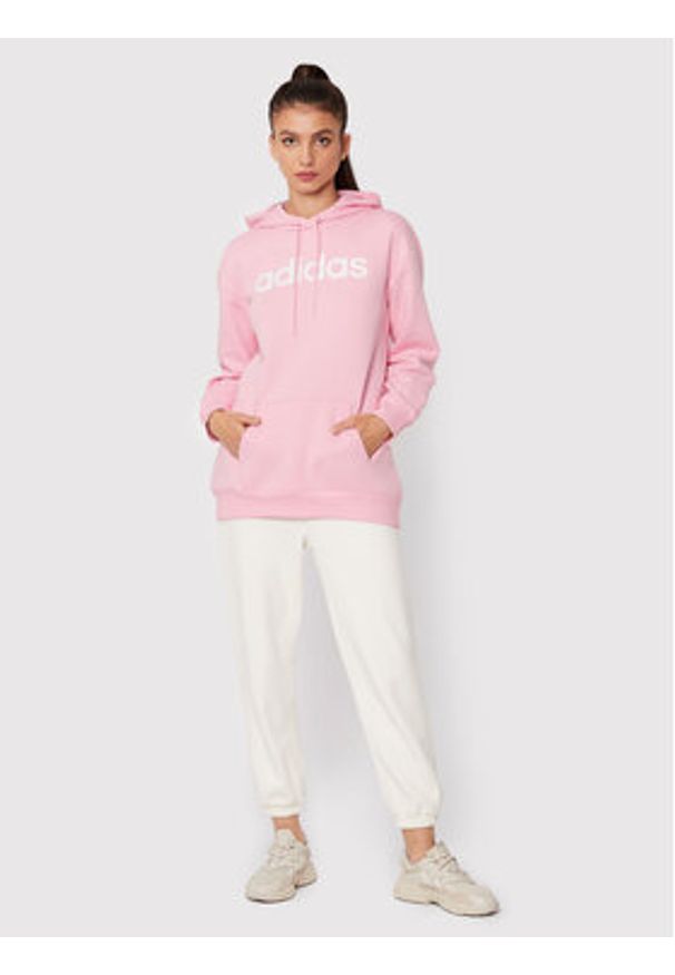 Adidas - adidas Bluza W Lin Ov HM1936 Różowy Relaxed Fit. Kolor: różowy. Materiał: bawełna