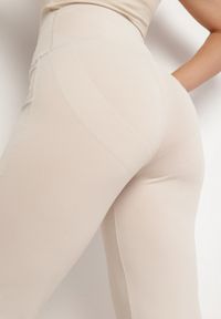 Born2be - Beżowe Legginsy Dzwony z Wysokim Stanem i Szeroką Gumką w Talii Idoreia. Okazja: na co dzień. Stan: podwyższony. Kolor: beżowy. Styl: casual, elegancki #7