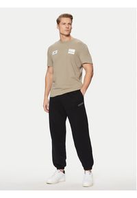 Guess Spodnie dresowe Z4YB00 KAIJ1 Czarny Relaxed Fit. Kolor: czarny. Materiał: bawełna #4