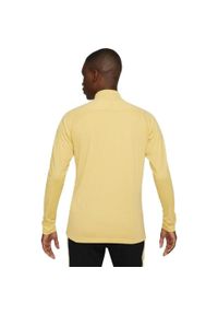 Nike - Męska Koszulka Academy 21 DriFIT Quarter Zip Drill Top. Kolor: żółty
