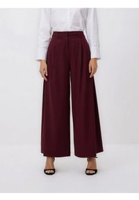 Reserved - Spodnie z szerokimi nogawkami - bordowy. Kolor: czerwony. Materiał: dzianina, wiskoza #1