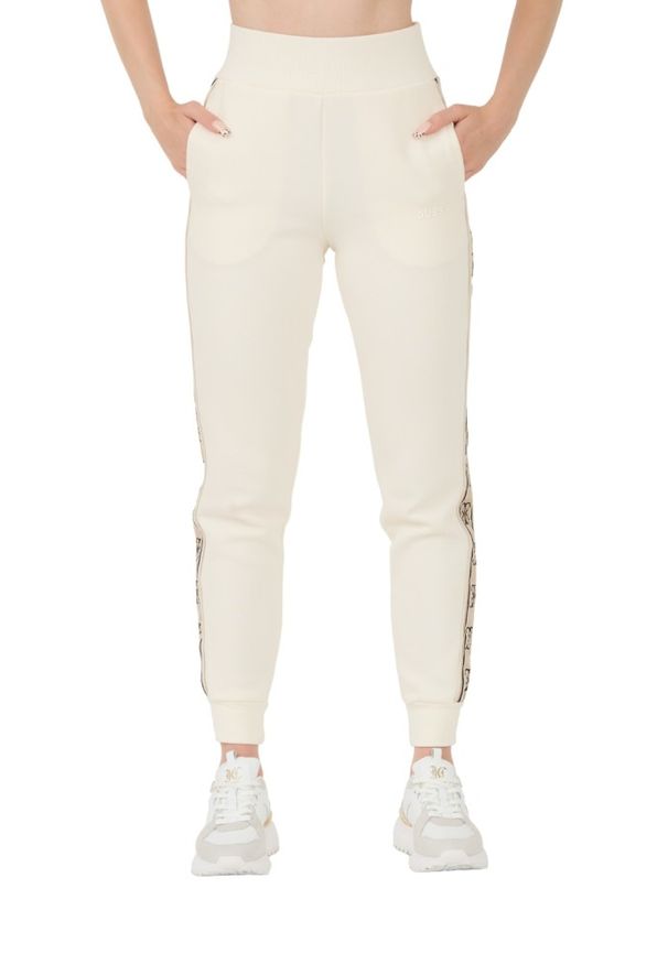 Guess - GUESS Beżowe damskie spodnie dresowe Britney Jogger, Rozmiar XL. Kolor: beżowy. Materiał: dresówka