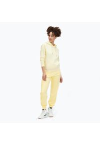 Fila - Spodnie damskie FILA Buetzow. Kolor: żółty. Materiał: dresówka