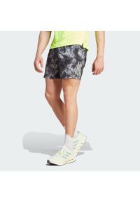 Adidas - Szorty Own the Run Allover Print. Kolor: czarny, szary, biały, wielokolorowy. Materiał: materiał. Wzór: nadruk. Sport: bieganie