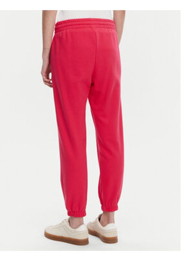 GAP - Gap Spodnie dresowe 889527-04 Różowy Relaxed Fit. Kolor: różowy. Materiał: bawełna