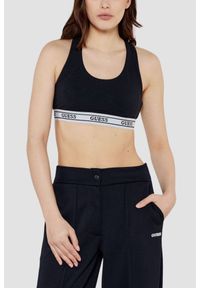 Guess - GUESS Czarny damski top sportowy Aline. Kolor: czarny. Styl: sportowy