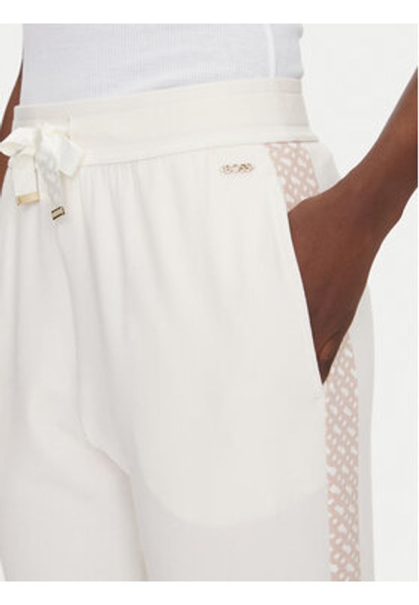 BOSS Spodnie dresowe Monogram 50535841 Écru Regular Fit. Materiał: syntetyk