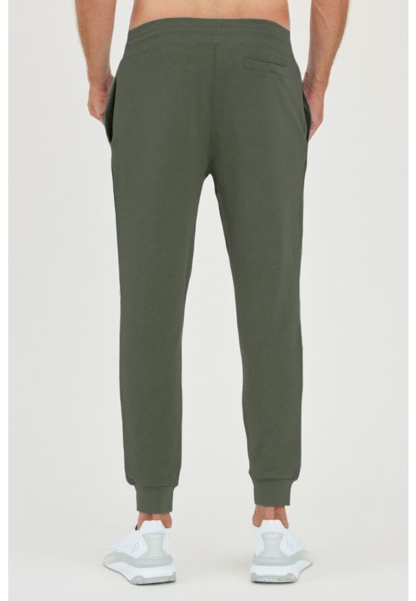 Guess - GUESS Zielone męskie spodnie dresowe Aldwin, Rozmiar S. Kolor: zielony. Materiał: dresówka