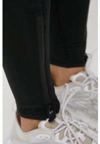 Only Play legginsy treningowe damskie kolor czarny gładkie. Kolor: czarny. Materiał: skóra. Wzór: gładki