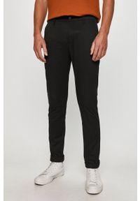 Calvin Klein Jeans - Spodnie. Kolor: czarny. Materiał: tkanina, bawełna, elastan. Wzór: gładki #1