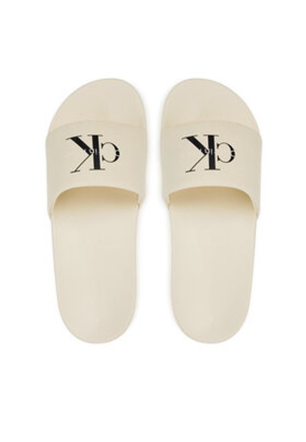 Calvin Klein Jeans Japonki Slide Monogram Wn Logo Ck YW0YW01967 Beżowy. Kolor: beżowy. Materiał: materiał