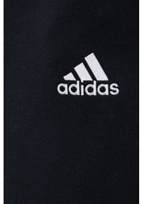 Adidas - adidas Spodnie męskie kolor czarny gładkie. Kolor: czarny. Materiał: poliester, dzianina. Wzór: gładki