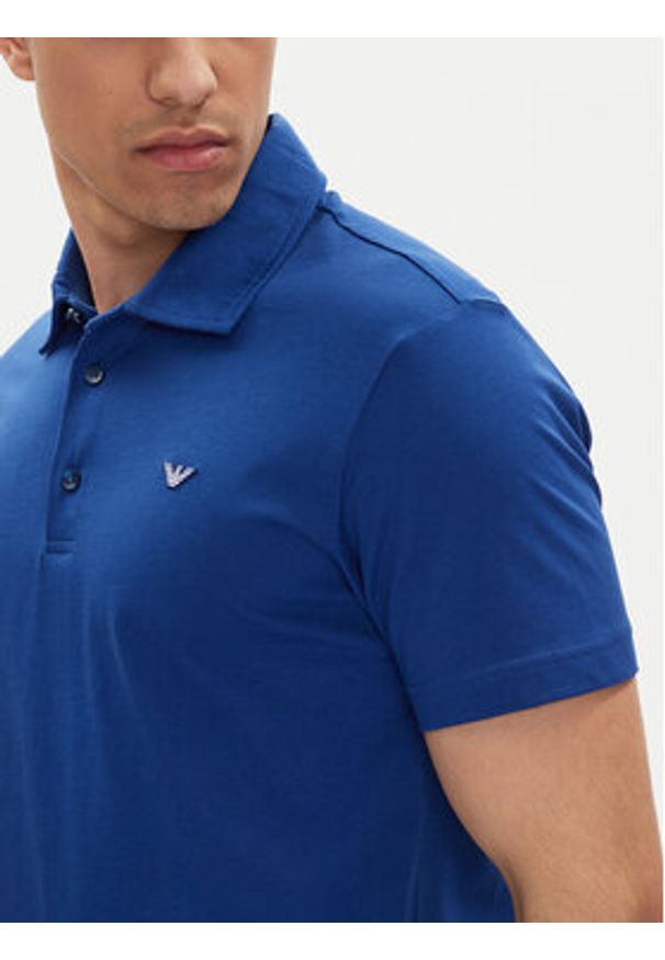 Emporio Armani Polo EM000571 AF12331 UB093 Niebieski Regular Fit. Typ kołnierza: polo. Kolor: niebieski. Materiał: bawełna