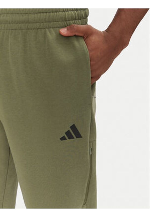 Adidas - adidas Spodnie dresowe Future Icons 3-Stripes JD4891 Zielony Loose Fit. Kolor: zielony. Materiał: bawełna, syntetyk