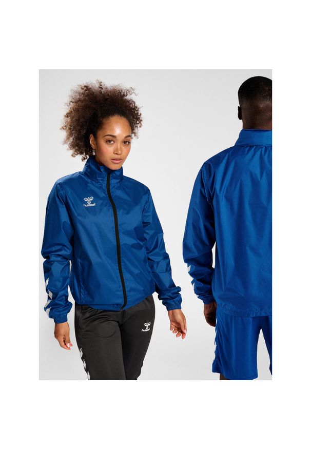 Kurtka ortalionowa piłkarska dla dorosłych Hummel Core XK Spray Jacket. Kolor: niebieski. Sport: piłka nożna