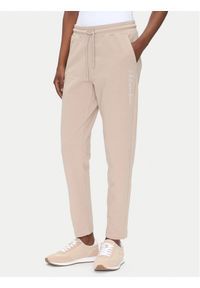EA7 Emporio Armani Spodnie dresowe 7W000489 AF12951 U6155 Beżowy Regular Fit. Kolor: beżowy. Materiał: bawełna