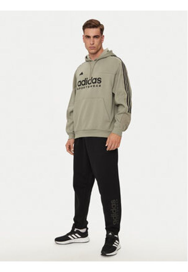 Adidas - adidas Spodnie dresowe ALL SZN Fleece Graphic IW1201 Czarny Regular Fit. Kolor: czarny. Materiał: bawełna, syntetyk