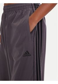 Adidas - adidas Spodnie dresowe Teamgeist adicolor JX6604 Szary Oversize. Kolor: szary. Materiał: syntetyk #5