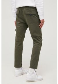 Tommy Jeans Spodnie męskie kolor zielony proste. Okazja: na co dzień. Kolor: zielony. Materiał: materiał, bawełna, tkanina. Wzór: gładki. Styl: casual