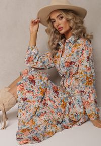 Renee - Jasnoniebieska Sukienka Rozkloszowana w Kwiaty Rotu. Kolor: niebieski. Długość rękawa: długi rękaw. Wzór: kwiaty. Długość: maxi