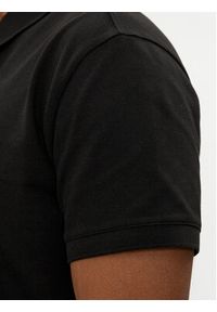 Tommy Jeans Polo Badge DM0DM18314 Czarny Regular Fit. Typ kołnierza: polo. Kolor: czarny. Materiał: bawełna #5