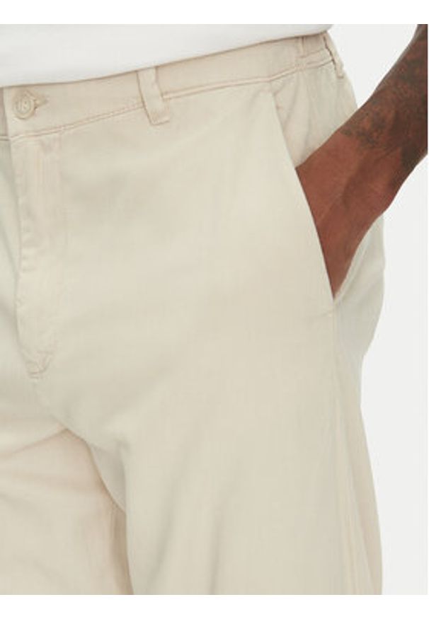 Lindbergh Spodnie materiałowe 30-008031 Beżowy Relaxed Fit. Kolor: beżowy. Materiał: bawełna
