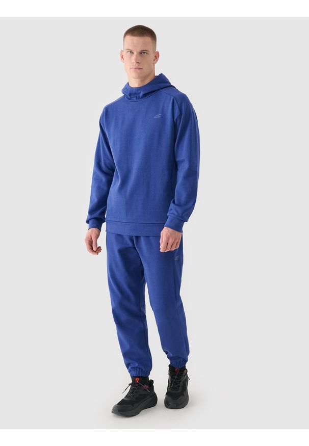 4f - 4F Bluza dresowa nierozpinana z kapturem męska - granatowa M. Okazja: na co dzień. Typ kołnierza: kaptur. Kolor: niebieski. Materiał: dresówka. Wzór: gładki, ze splotem. Styl: casual, sportowy