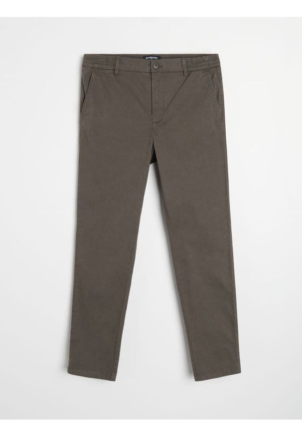 Sinsay - Spodnie chino slim - zielony. Kolor: zielony