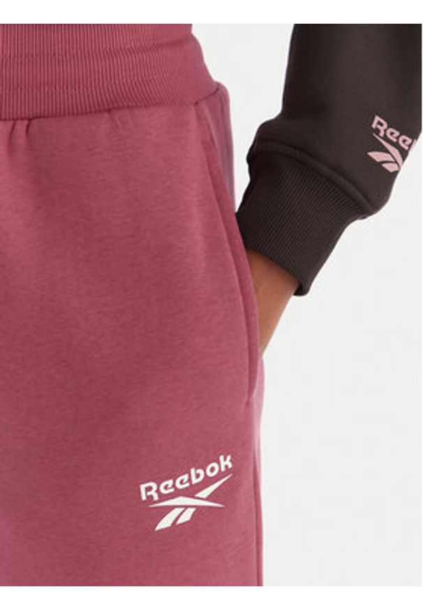 Reebok Spodnie dresowe Erika RK25164CCW Różowy Regular Fit. Kolor: różowy. Materiał: syntetyk