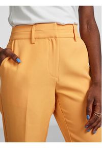 YAS Spodnie materiałowe 26028860 Pomarańczowy Regular Fit. Kolor: pomarańczowy. Materiał: materiał