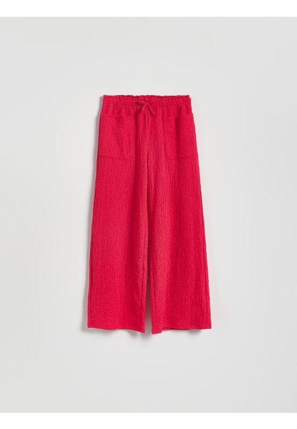 Reserved - Strukturalne spodnie z wiązaniem - fuksja. Kolor: różowy. Materiał: dzianina, bawełna