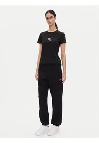 Calvin Klein Jeans Spodnie dresowe Monologo LV047B235G Czarny Regular Fit. Kolor: czarny. Materiał: bawełna #4