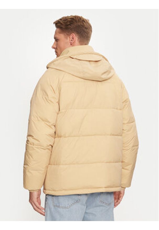 Tommy Jeans Kurtka zimowa DM0DM20003 Beżowy Relaxed Fit. Kolor: beżowy. Materiał: syntetyk. Sezon: zima